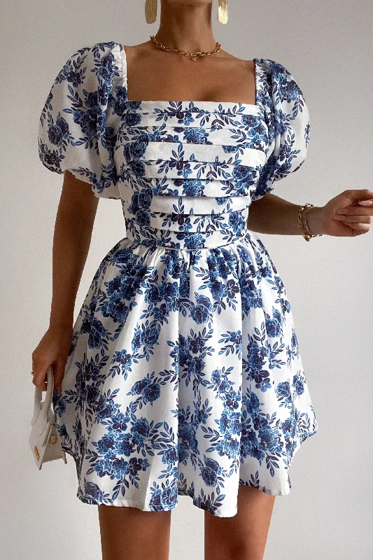 Mini dresses with gathered skirts for a voluminous effect Mezel Floral Mini Dress
