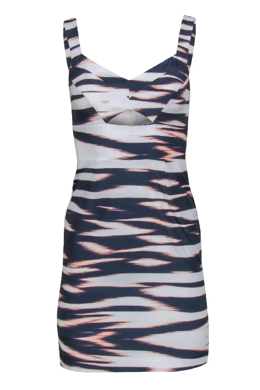Printed Abstract Women Dress for a Modern and Artistic Appeal Printed Abstract Women Dress for a Modern and Artistic Appeal Yumi Kim - White, Navy & Blush Marbled Sleeveless Sheath Dress w/ Cutout Sz XS